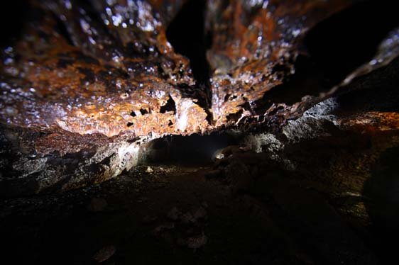 Cave passage with volcanic decoration on the roof. Photo by Topaz Aral
