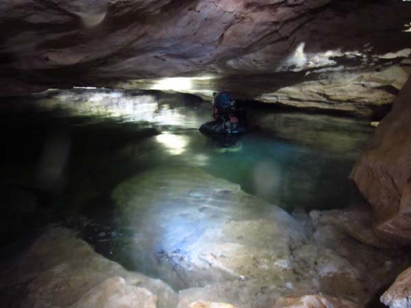 Tom (author) splashing around at the start of Sheathers Cave, near Mt. Gambier. It is one massive underground lake. Photo by Topaz Aral
