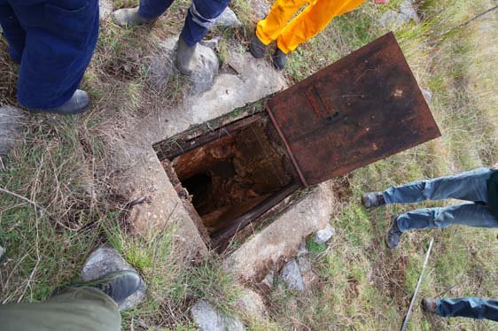 The entrance to Exponential Pot - Open only for surveying or other work. A rare occurance. Photo by Topaz Aral